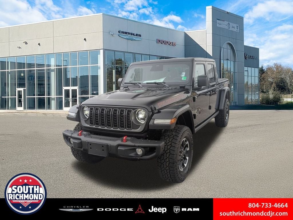 2026 Jeep Gladiator GLADIATOR RUBICON X 4X4 in Black Clear-Coat Exterior Paint — front three-quarter view