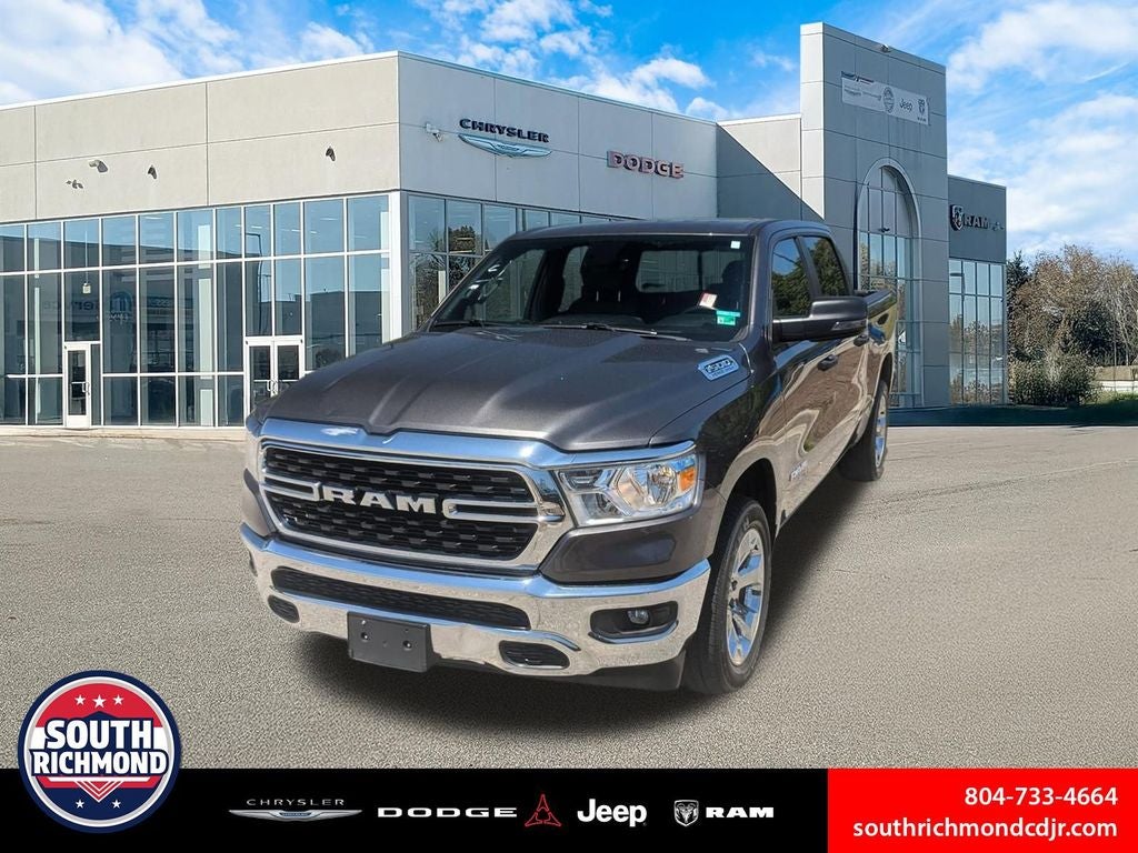 2023 RAM 1500 Big Horn Crew Cab 4x4 5'7' Box in Granite Crystal Metallic Clearcoat — front three-quarter view