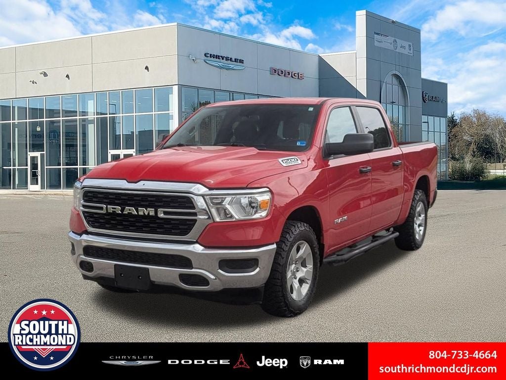 2024 RAM 1500 Lone Star Crew Cab 4x4 5'7' Box in Flame Red Clearcoat — front three-quarter view