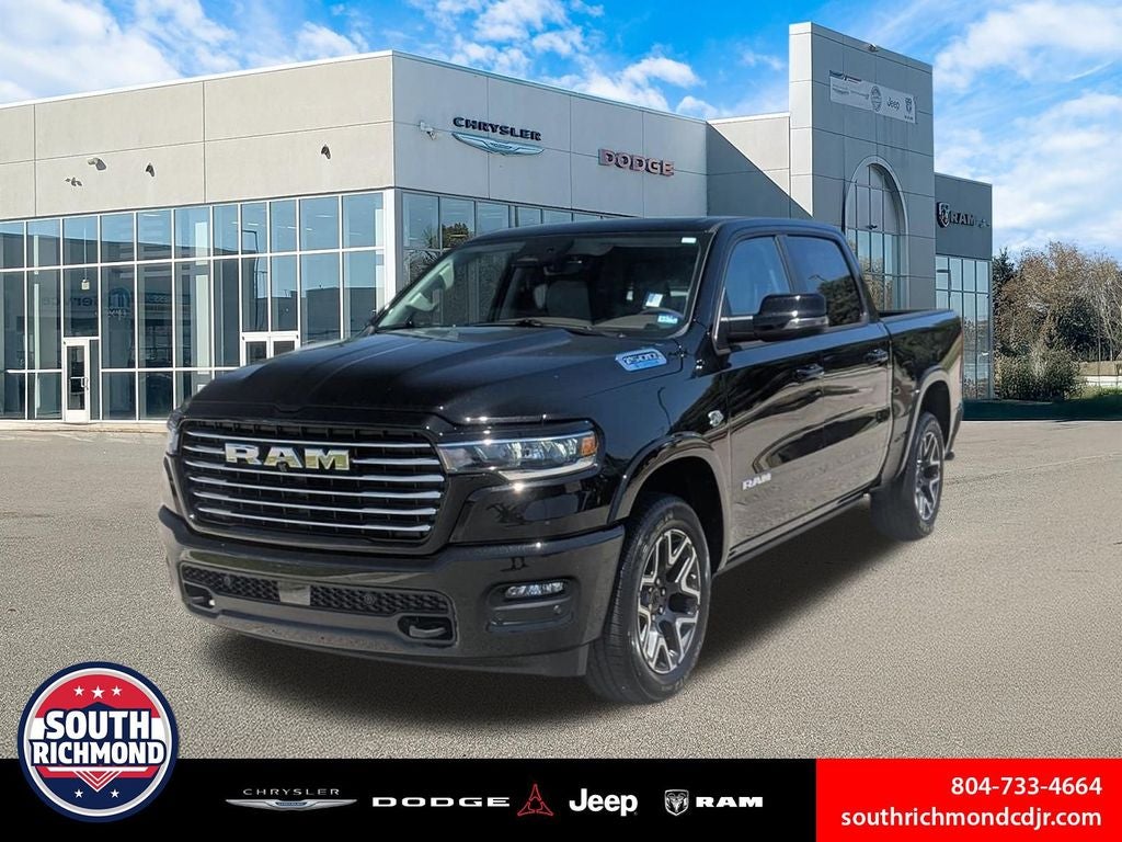 2026 RAM Ram 1500 RAM 1500 LARAMIE CREW CAB 4X4 5'7' BOX in Diamond Black Crystal Pearl-Coat Exterior Paint — front three-quarter view
