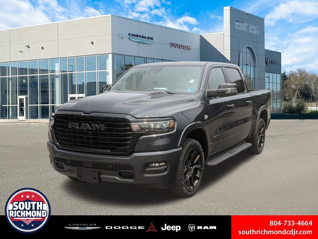 2026 RAM Ram 1500 RAM 1500 LARAMIE CREW CAB 4X4 5'7' BOX in Forged Blue Metallic Exterior Paint — front three-quarter view