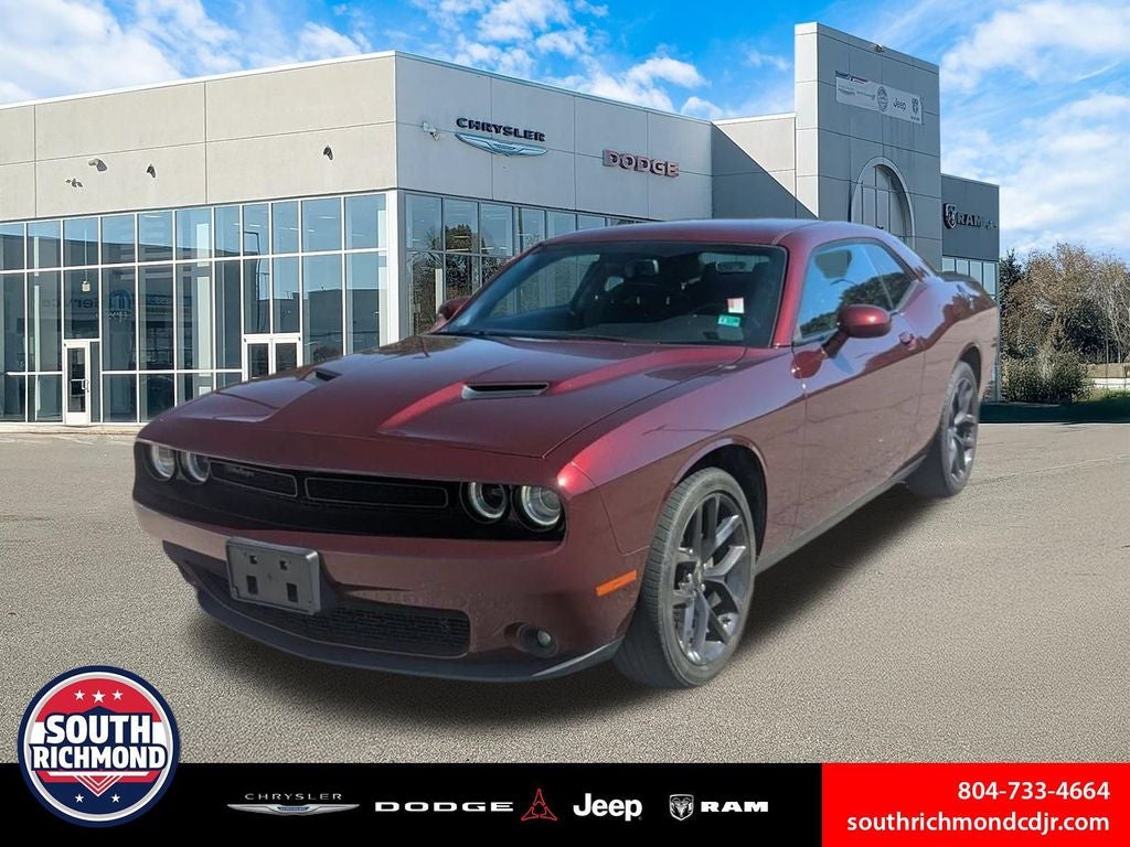 2021 Dodge Challenger SXT in Octane Red Pearlcoat — front three-quarter view
