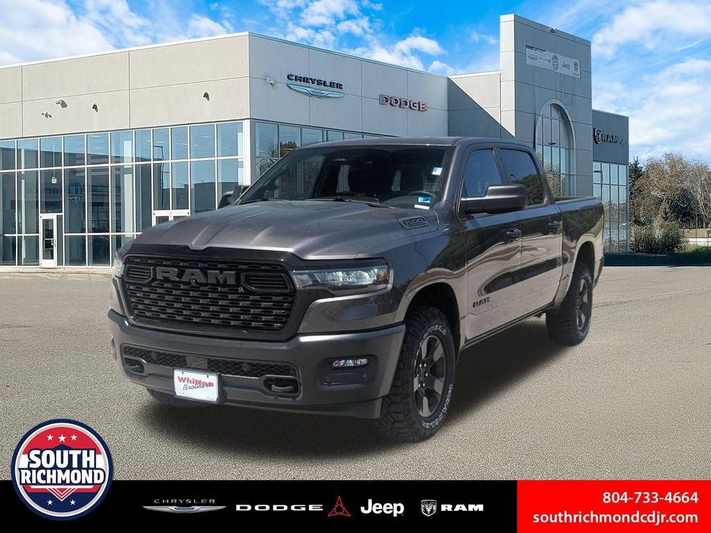 2026 RAM Ram 1500 RAM 1500 WARLOCK CREW CAB 4X4 5'7' BOX in Granite Crystal Metallic Clear-Coat Exterior Paint — front three-quarter view