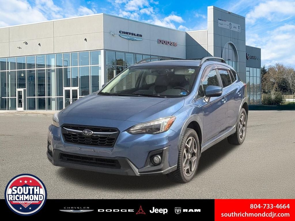 2018 Subaru Crosstrek 2.0i Limited in Quartz Blue Pearl — front three-quarter view